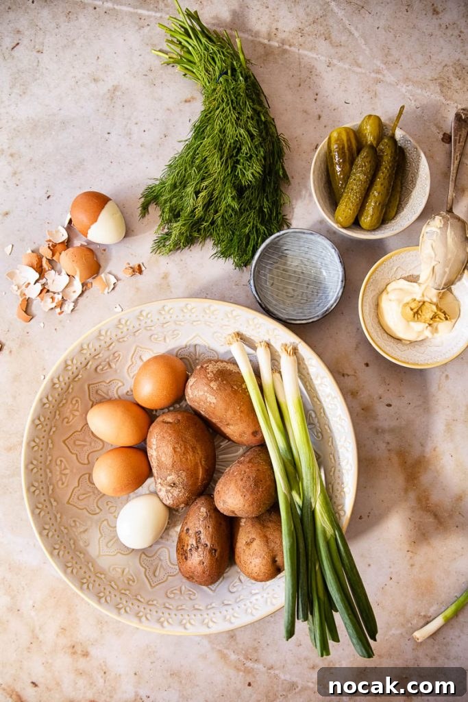 Creamy Dill Potato Salad with Fresh Herbs 5 ingredients on a table from overhead