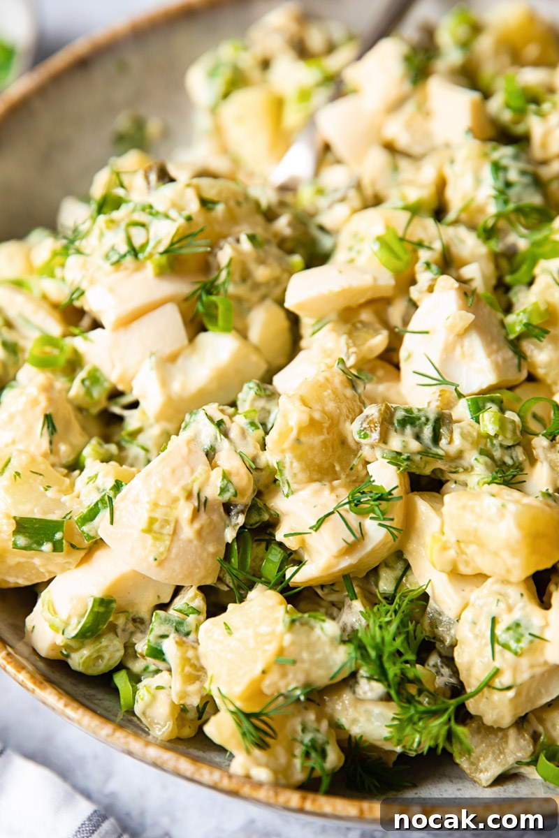 Creamy Dill Potato Salad with Fresh Herbs 6 side view of dill potato salad