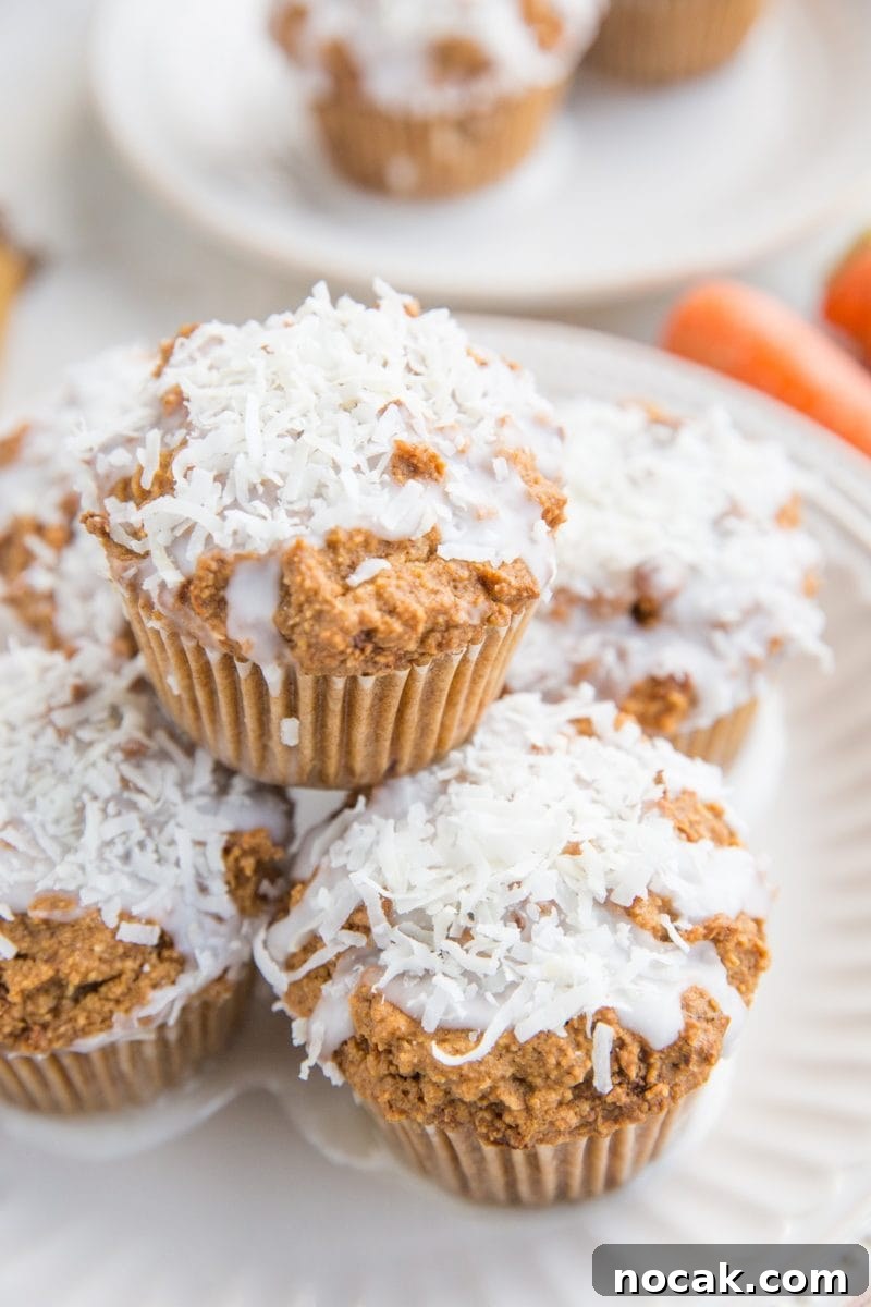 Low-Carb Carrot Cake Muffins with Almond Flour and Cream Cheese Frosting 4 Plate of low-carb carrot cake muffins