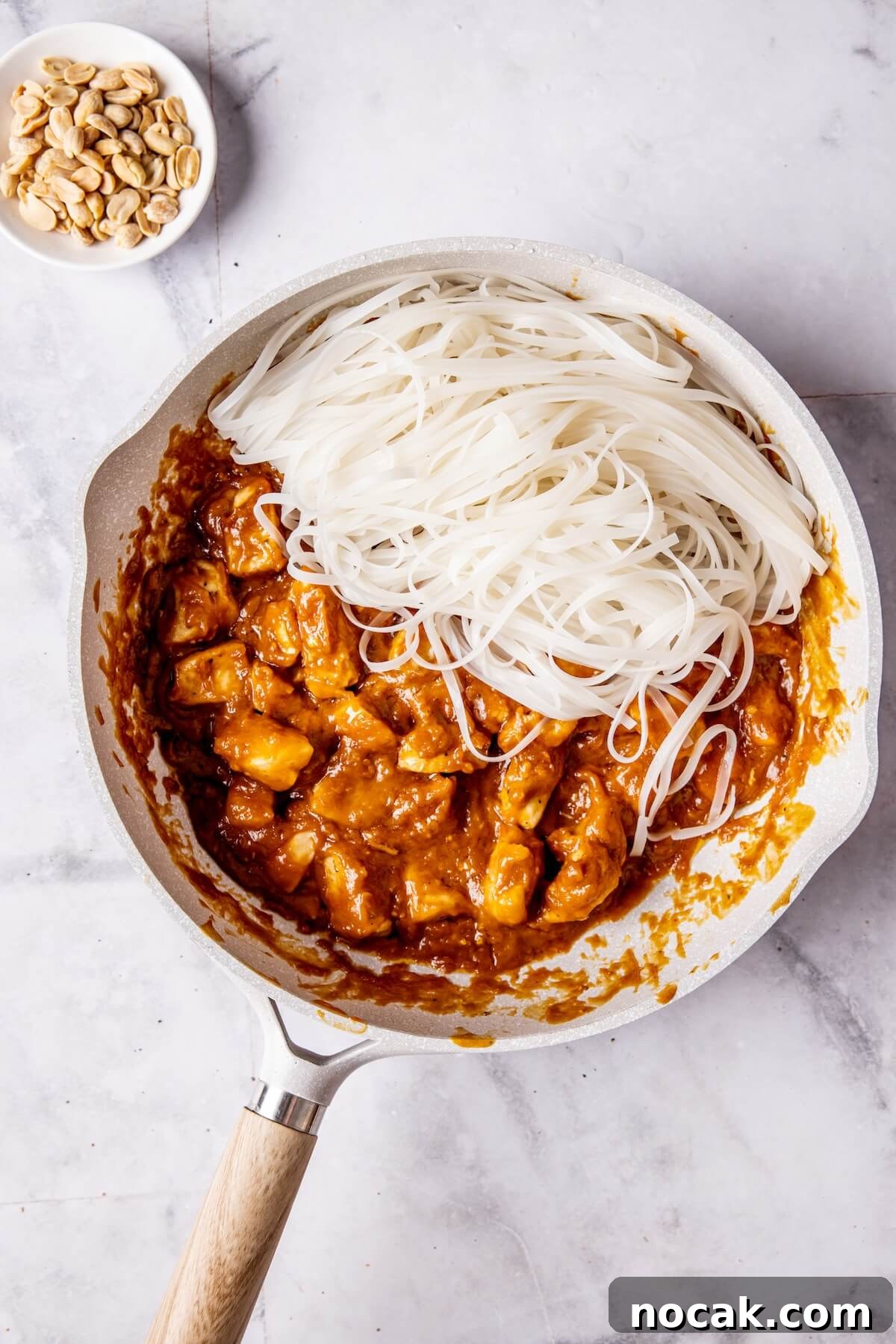 Creamy Spicy Peanut Noodles with Garlic and Lime 13 How to Make Easy Saucy Peanut Noodles Step 6 - Olivia Adriance