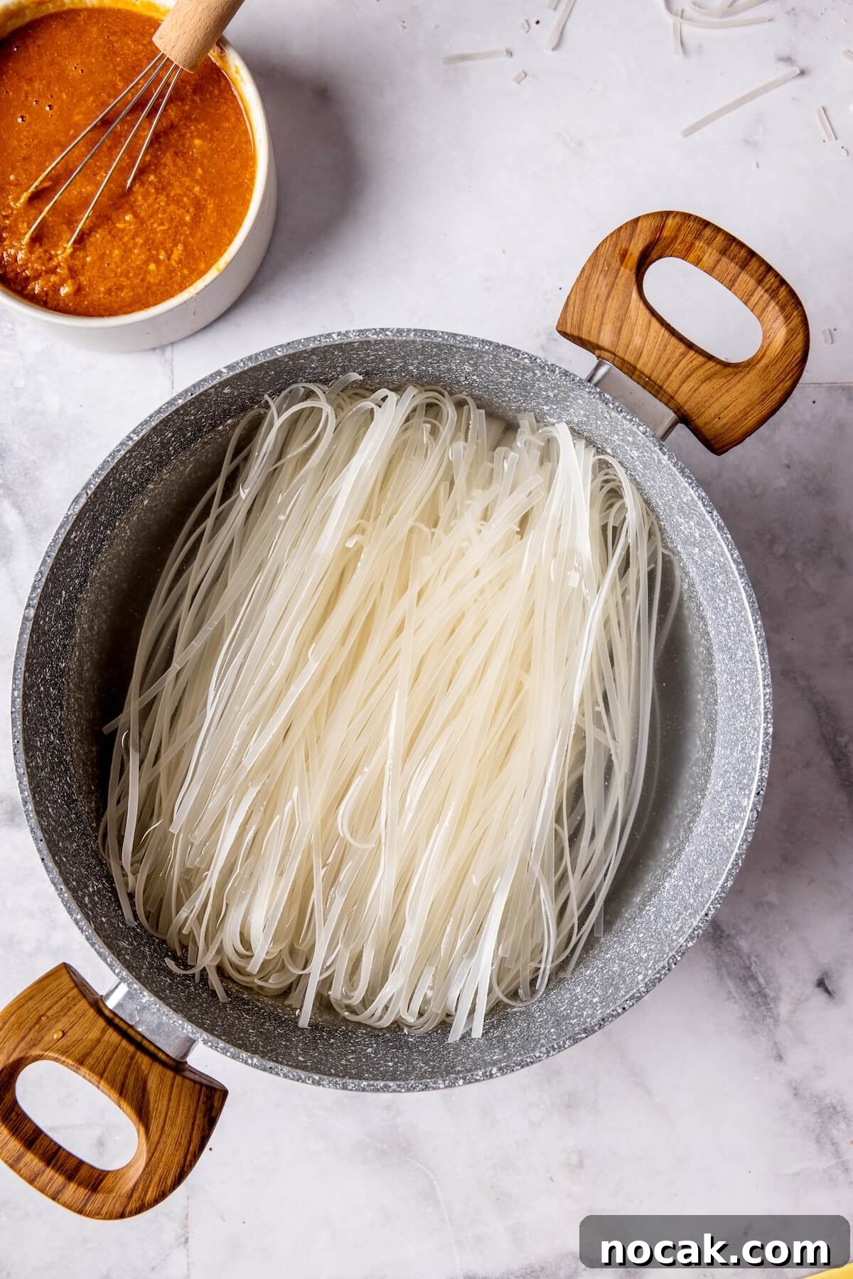 Creamy Spicy Peanut Noodles with Garlic and Lime 9 How to Make Easy Saucy Peanut Noodles Step 2 - Olivia Adriance