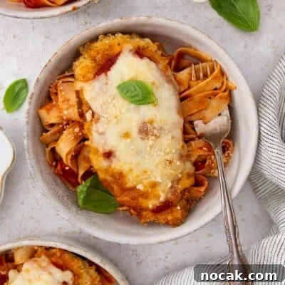 Crispy Gluten-Free Chicken Parmesan Recipe for Dinner 12 An overhead view of gluten-free chicken parmesan in a dish.
