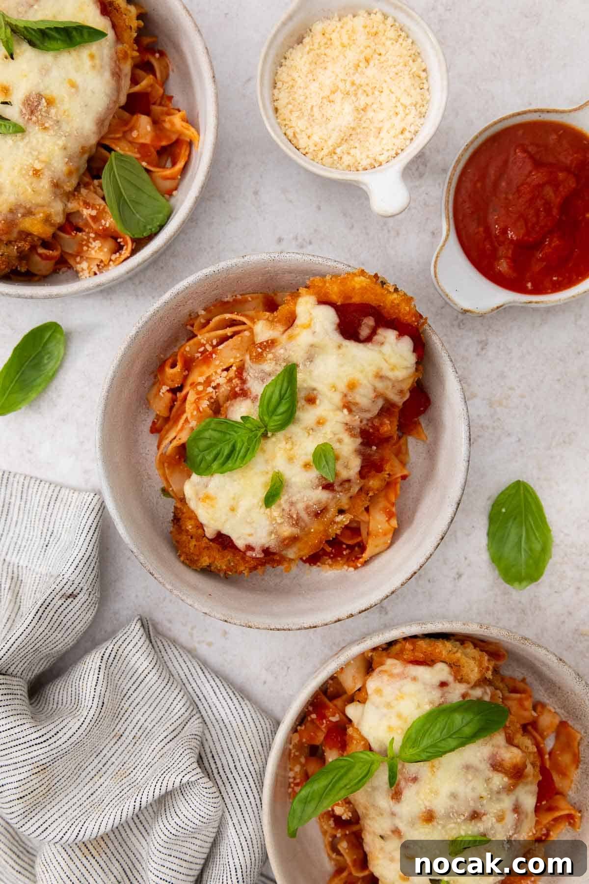 Crispy Gluten-Free Chicken Parmesan Recipe for Dinner 3 An overhead view of gluten-free chicken parmesan in a dish.