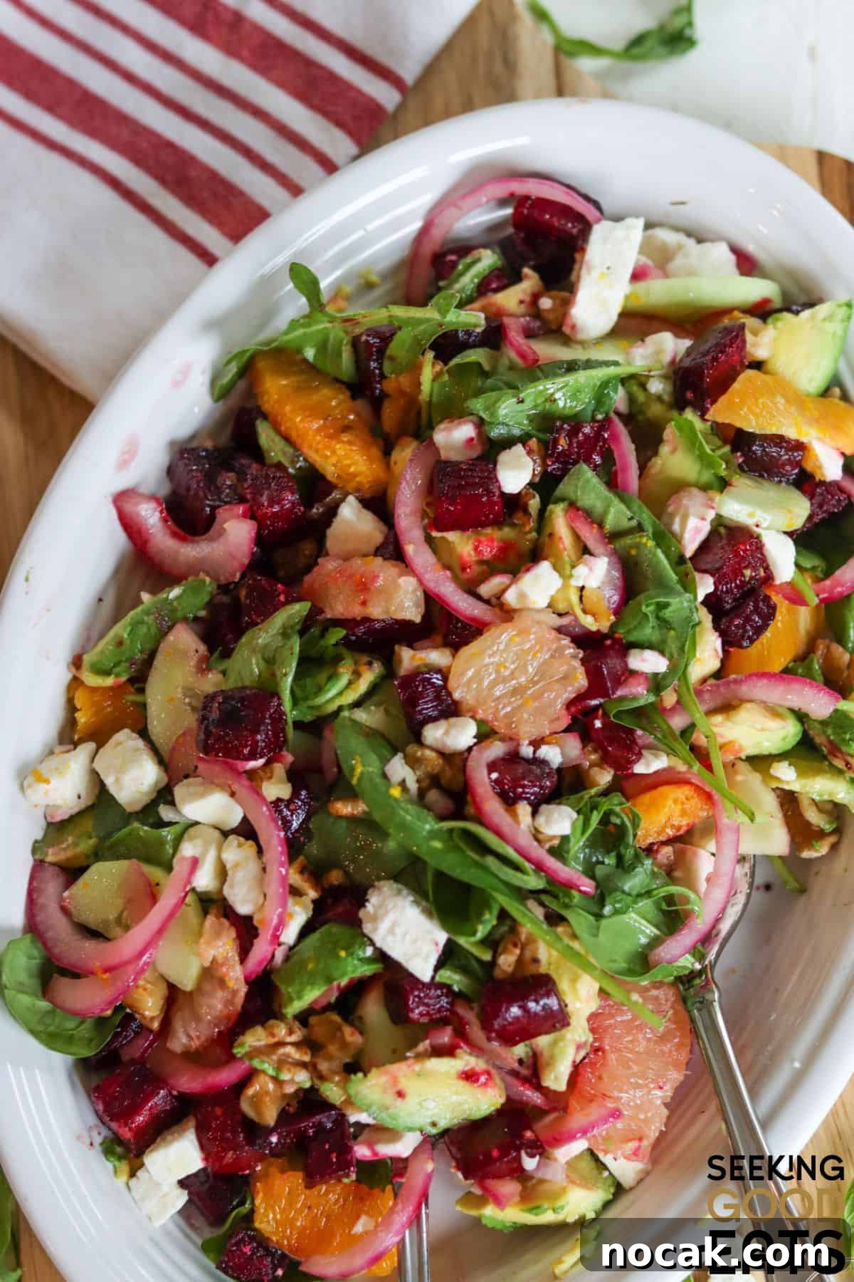Roasted Beet and Feta Salad with Citrus Vinaigrette Recipe 2 Roasted beet salad recipe with feta cheese served on a white plate.