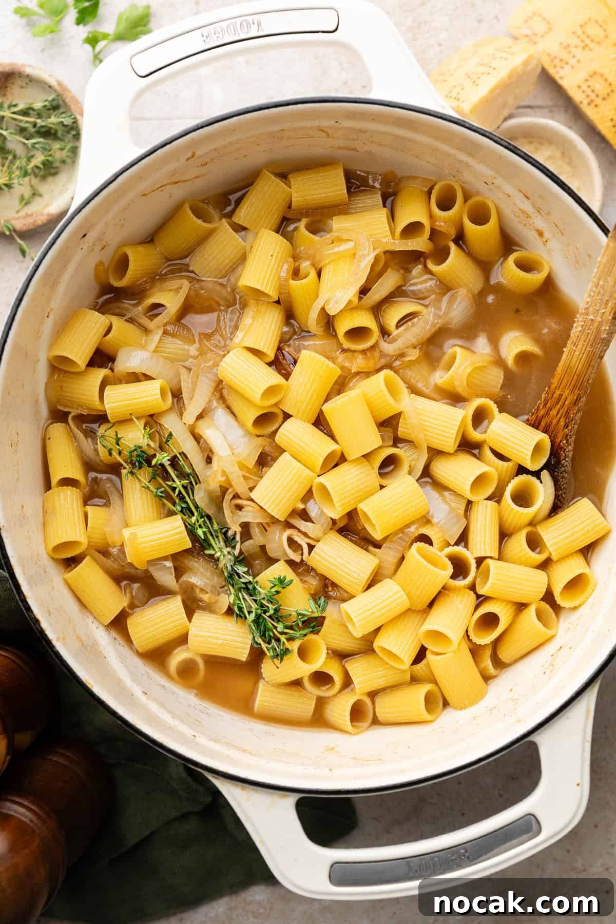 Creamy French Onion Sausage Pasta Recipe 6 noodles and broth in dutch oven
