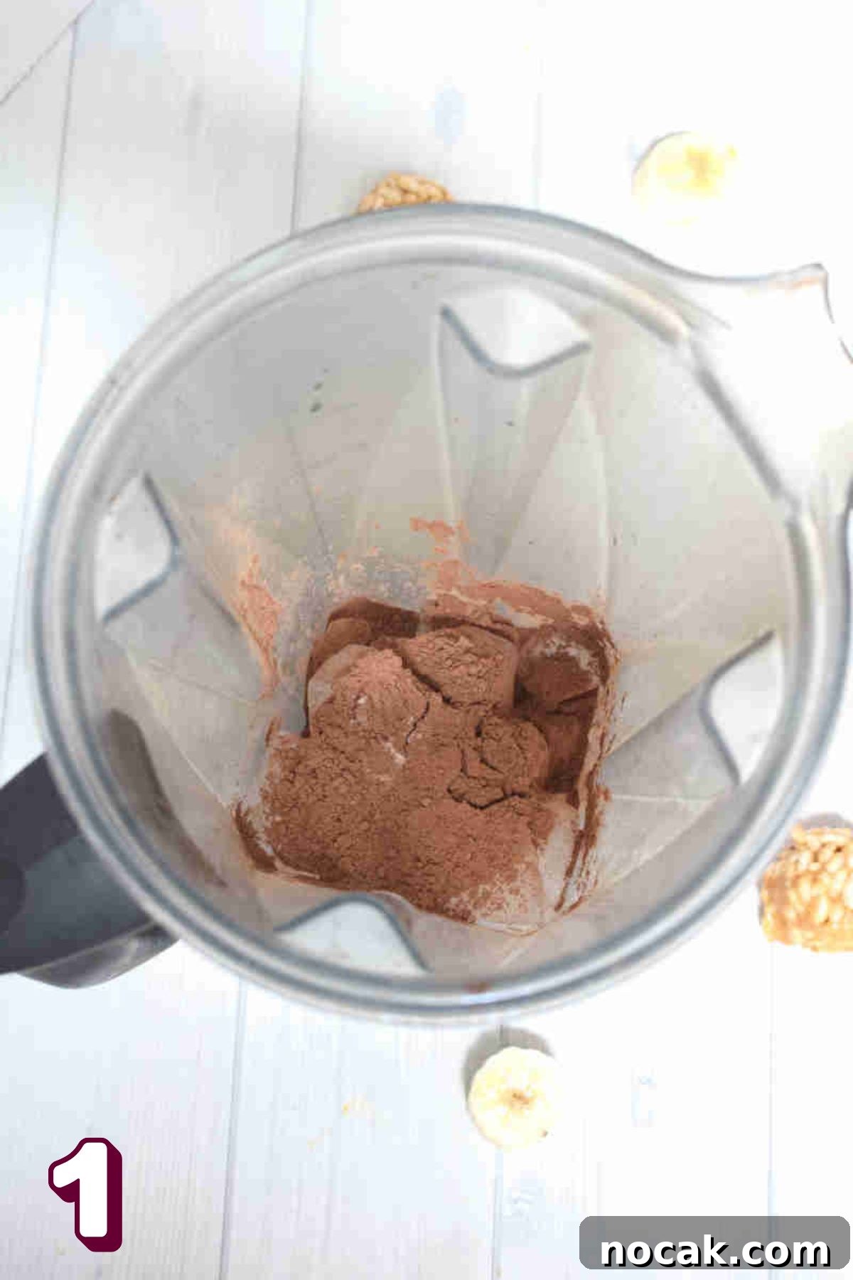 Peanut Butter Cup Protein Shake — 22g Protein Per Serving 4 Bananas and cacao powder in a blender.