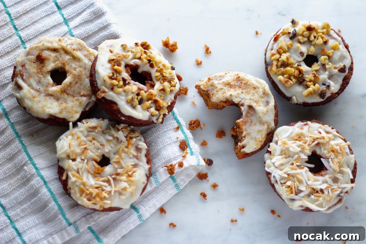 Paleo Carrot Cake Donuts Recipe — Gluten-Free Baked Donuts 3 Paleo Carrot Cake Donuts - soft, coconut butter-glazed carrot cake donuts that are grain-free, gluten-free, nut-free, and refined sugar-free! | fedandfulfilled.com