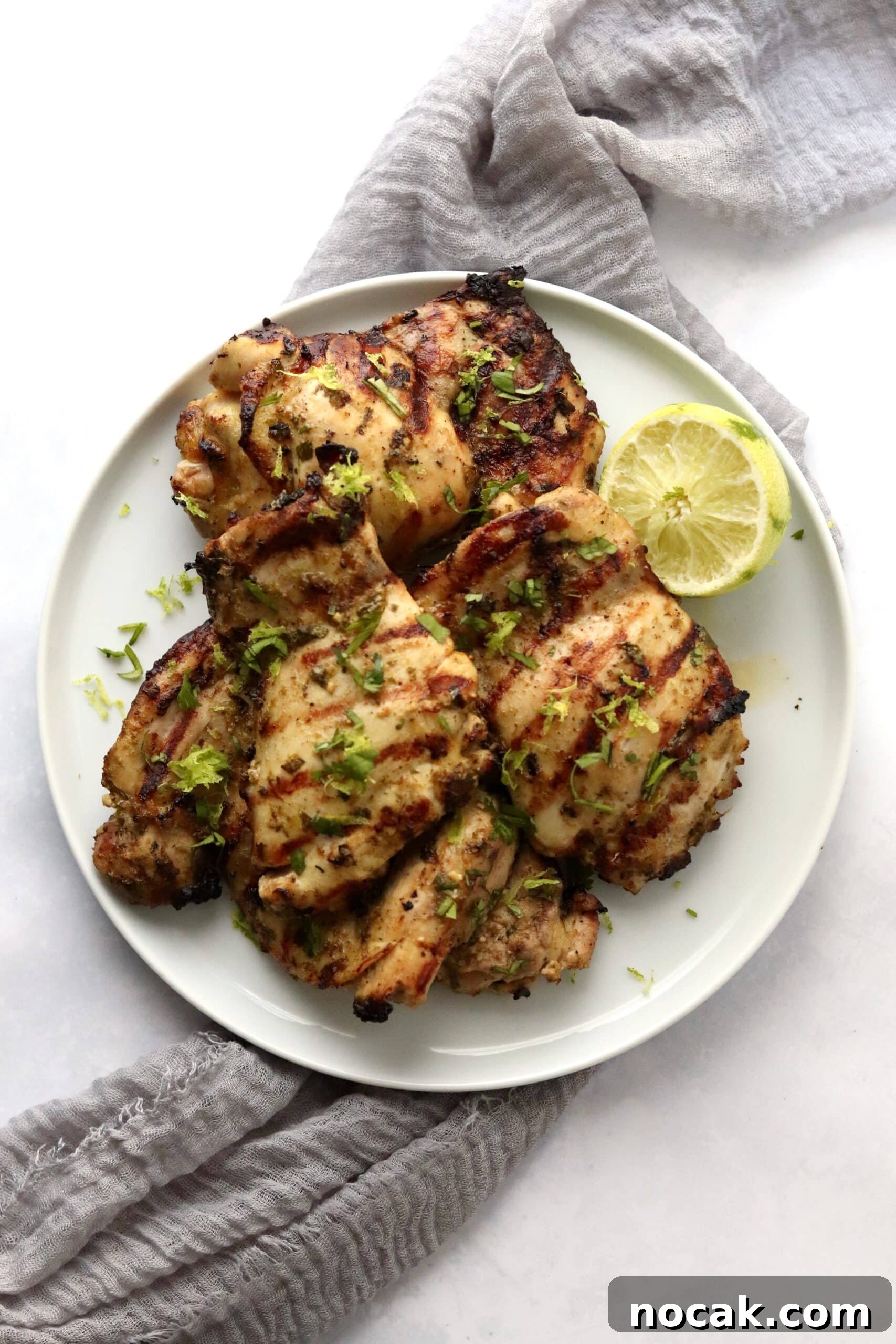 Grilled chicken thighs with lime marinade