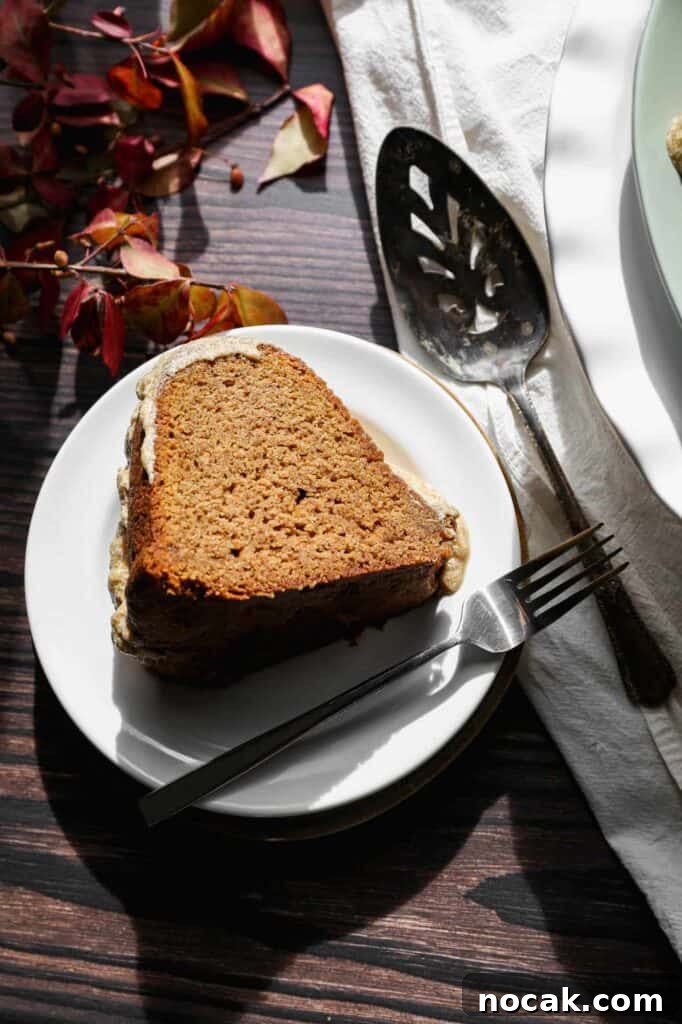Gluten-Free Pumpkin Spice Bundt Cake Recipe for Fall Gatherings 3 a slice of gluten free pumpkin spice bundt cake on a plate