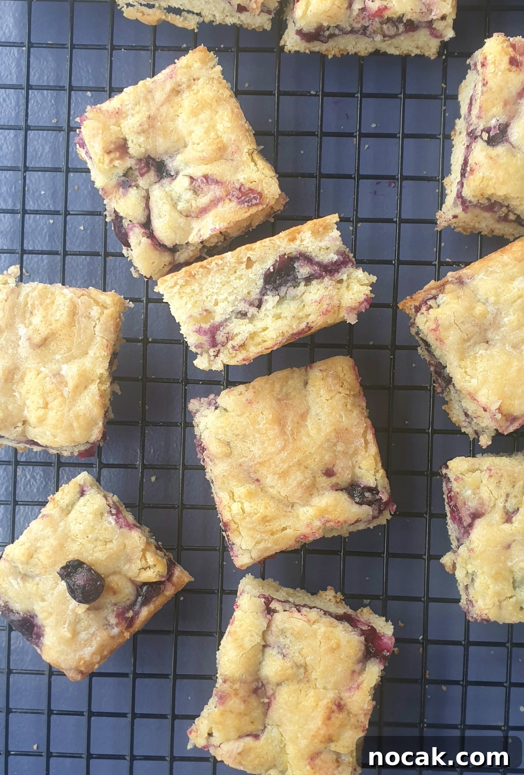 Chewy Blueberry Bars with Lemon Glaze—Simple Summer Dessert 3 blueberry bars - fresh blueberry recipe