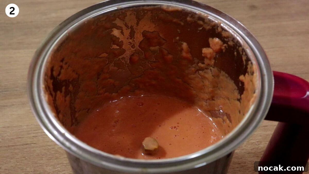 Garlic Chicken Curry (Lehsuni Murgh) Recipe — Aromatic Indian Dish 4 making cashew tomato paste for garlic chicken curry recipe.