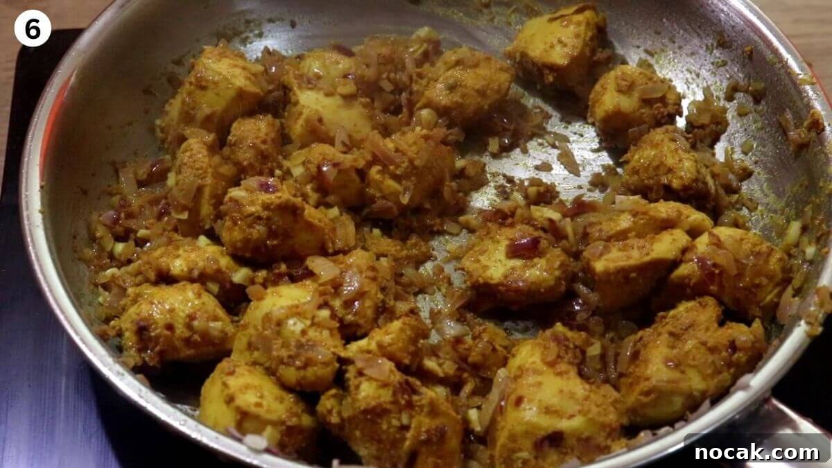 Garlic Chicken Curry (Lehsuni Murgh) Recipe — Aromatic Indian Dish 8 addition of chicken and cooking it to make garlic chicken curry