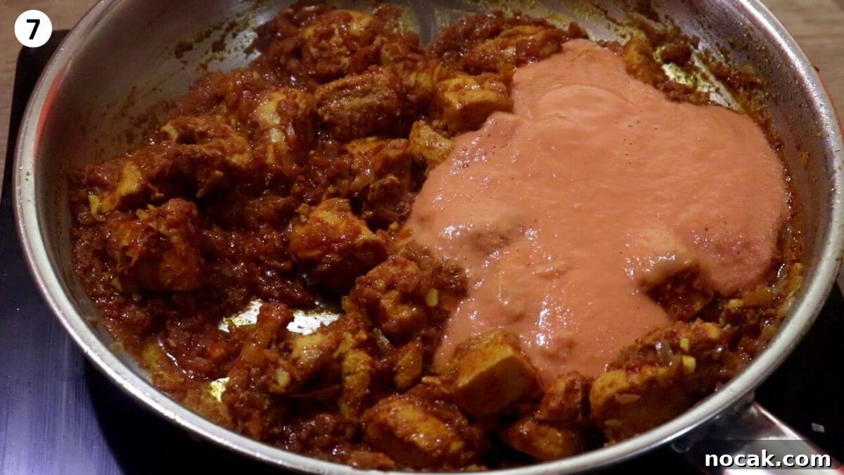 Garlic Chicken Curry (Lehsuni Murgh) Recipe — Aromatic Indian Dish 9 addition of tomato cashew paste to make garlic chicken curry.