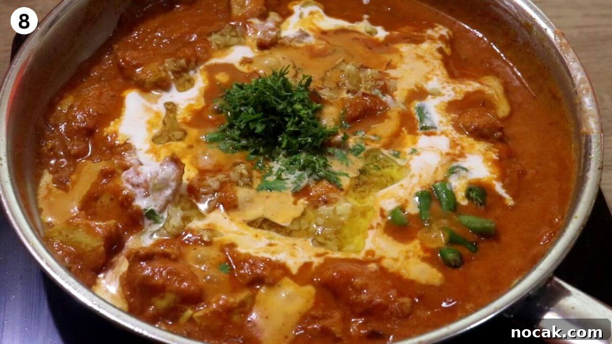 Garlic Chicken Curry (Lehsuni Murgh) Recipe — Aromatic Indian Dish 10 addition of cream, fried garlic butter, and coriander leaves to make garlic chicken curry.