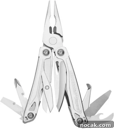 2025 Holiday Gift Guide: Top Picks for Every Recipient 11 A stainless steel multitool with various extended tools, including pliers, a knife, file, screwdriver, bottle opener, and more.