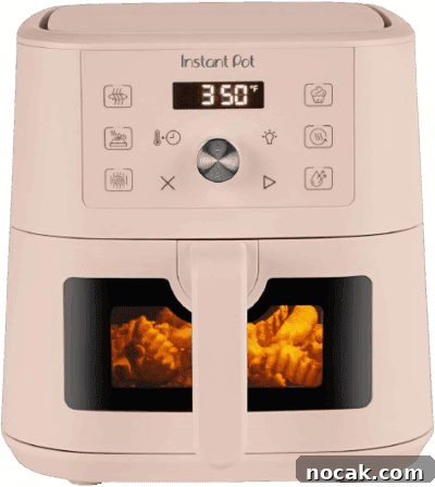 2025 Holiday Gift Guide: Top Picks for Every Recipient 41 A beige Instant Pot air fryer with a digital display.