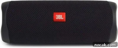 2025 Holiday Gift Guide: Top Picks for Every Recipient 9 A black JBL portable Bluetooth speaker with a red and white JBL logo in the center, mesh fabric covering the speaker, and rubberized ends.