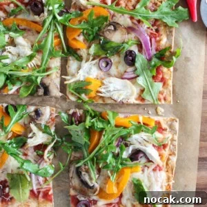 High-Protein Lavash Pizza Ready in 10 Minutes 12 A close up shot of slices of lavash bread pizza.