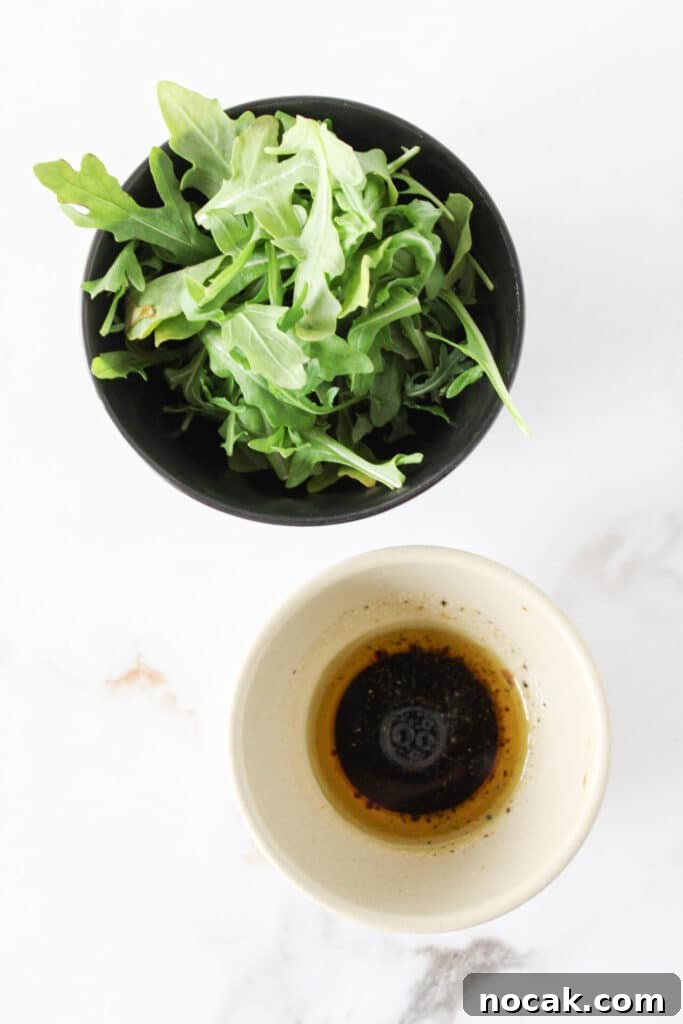 High-Protein Lavash Pizza Ready in 10 Minutes 8 Arugula and balsamic vinegar, salt, pepper and olive oil in a bowl