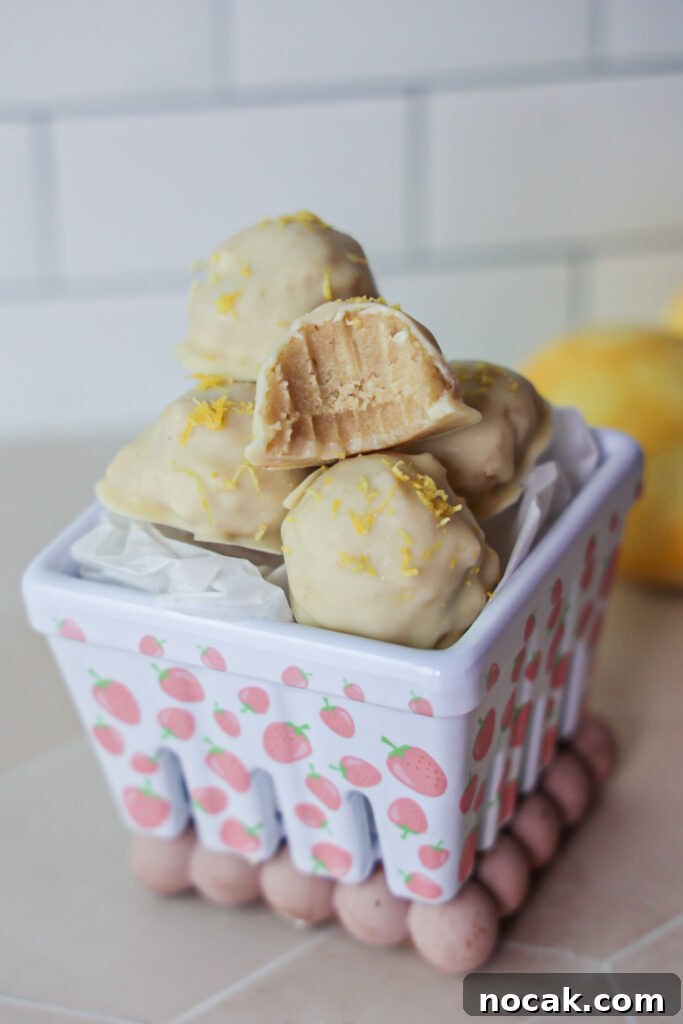 Zesty Lemon Truffles: Creamy Citrus Chocolate Bites 2 No bake lemon truffles on a plate