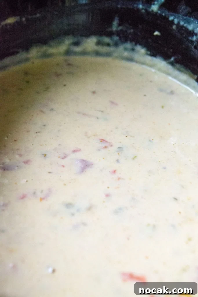 Queso Blanco Dip in a slow cooker