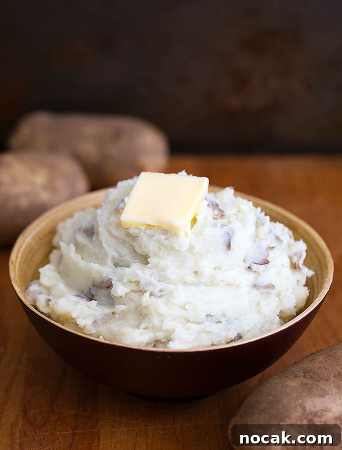 Thanksgiving Recipes for Instant Pot: Fast Holiday Favorites 11 Mashed Potatoes with a slice of butter,in a brown bowl