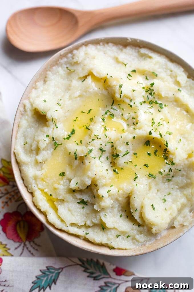 Thanksgiving Recipes for Instant Pot: Fast Holiday Favorites 13 Mashed Cauliflower in a beige bowl