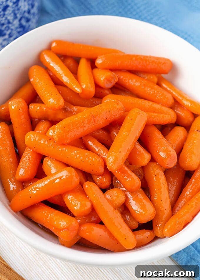Thanksgiving Recipes for Instant Pot: Fast Holiday Favorites 15 Cinnamon Glazed Carrots in a white bowl