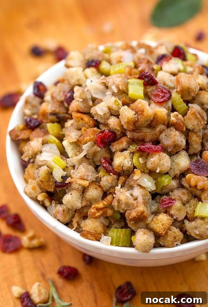 Thanksgiving Recipes for Instant Pot: Fast Holiday Favorites 5 Stuffing in a white bowl on a wooden board