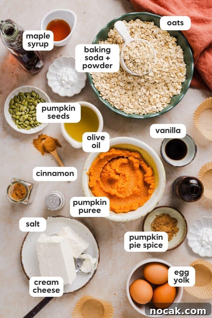 Pumpkin Cream Cheese Muffins with Swirled Filling and Spice 3 Ingredients for pumpkin cream cheese muffins displayed in small bowls on a marble counter.