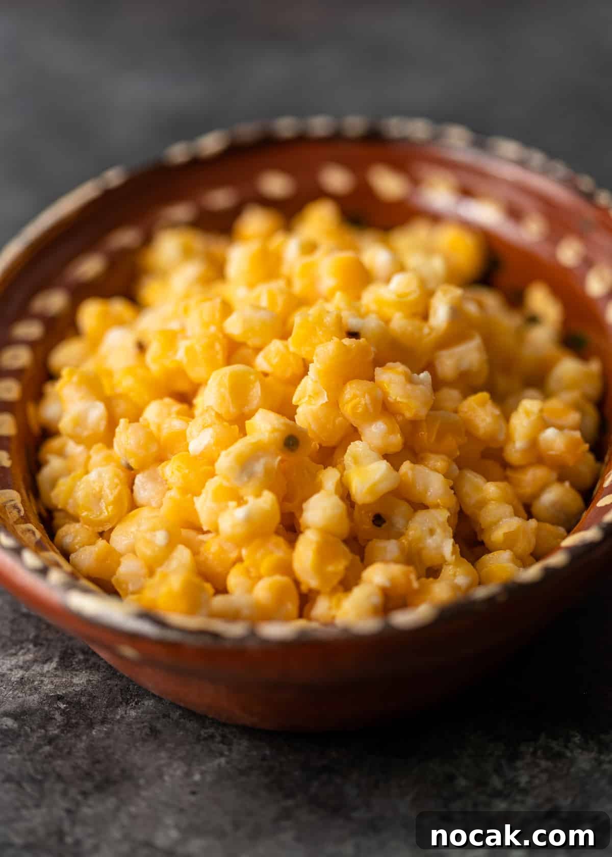 Hominy: What It Is and How to Cook with It 6 golden hominy in Mexican potter bowl