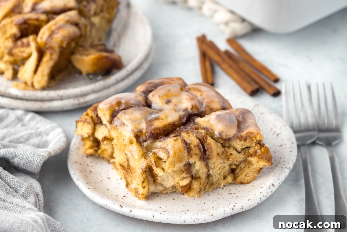 Cinnamon Roll Casserole Breakfast Bake Recipe 15 Cinnamon roll bake on a plate.