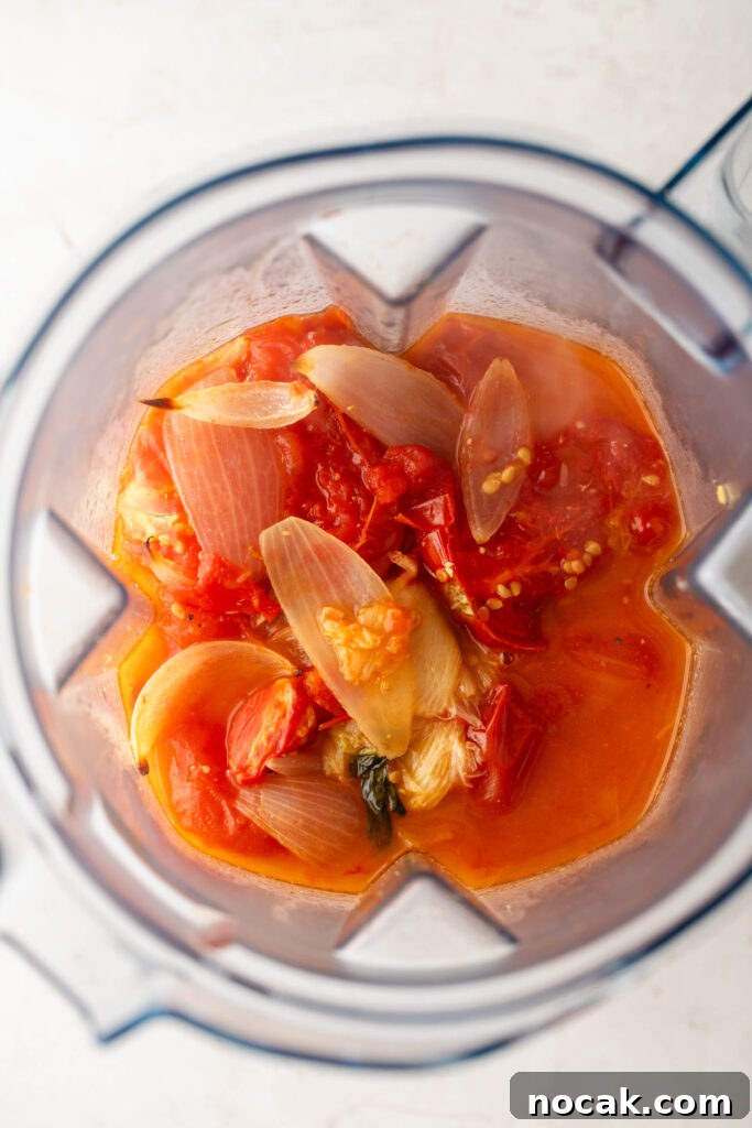 Creamy Sheet-Pan Roasted Tomato Soup 9 roasted tomatoes, onions, chicken broth, fresh basil, and garlic in a blender