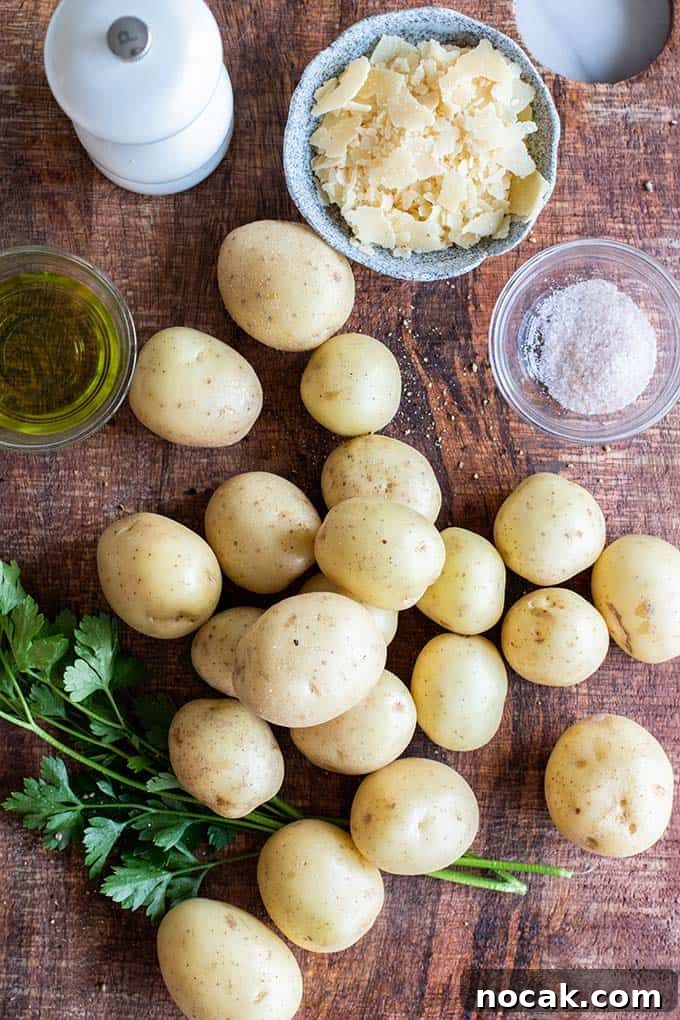 Crispy Parmesan Oven-Baked Smashed Potatoes 3 Ingredients for making breakfast potatoes, including cocktail potatoes, parmesan, parsley, salt and pepper.