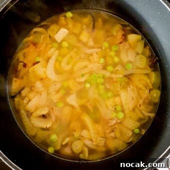 Lemony Fennel and Pea Soup with Fresh Herbs 14 Simmering soup