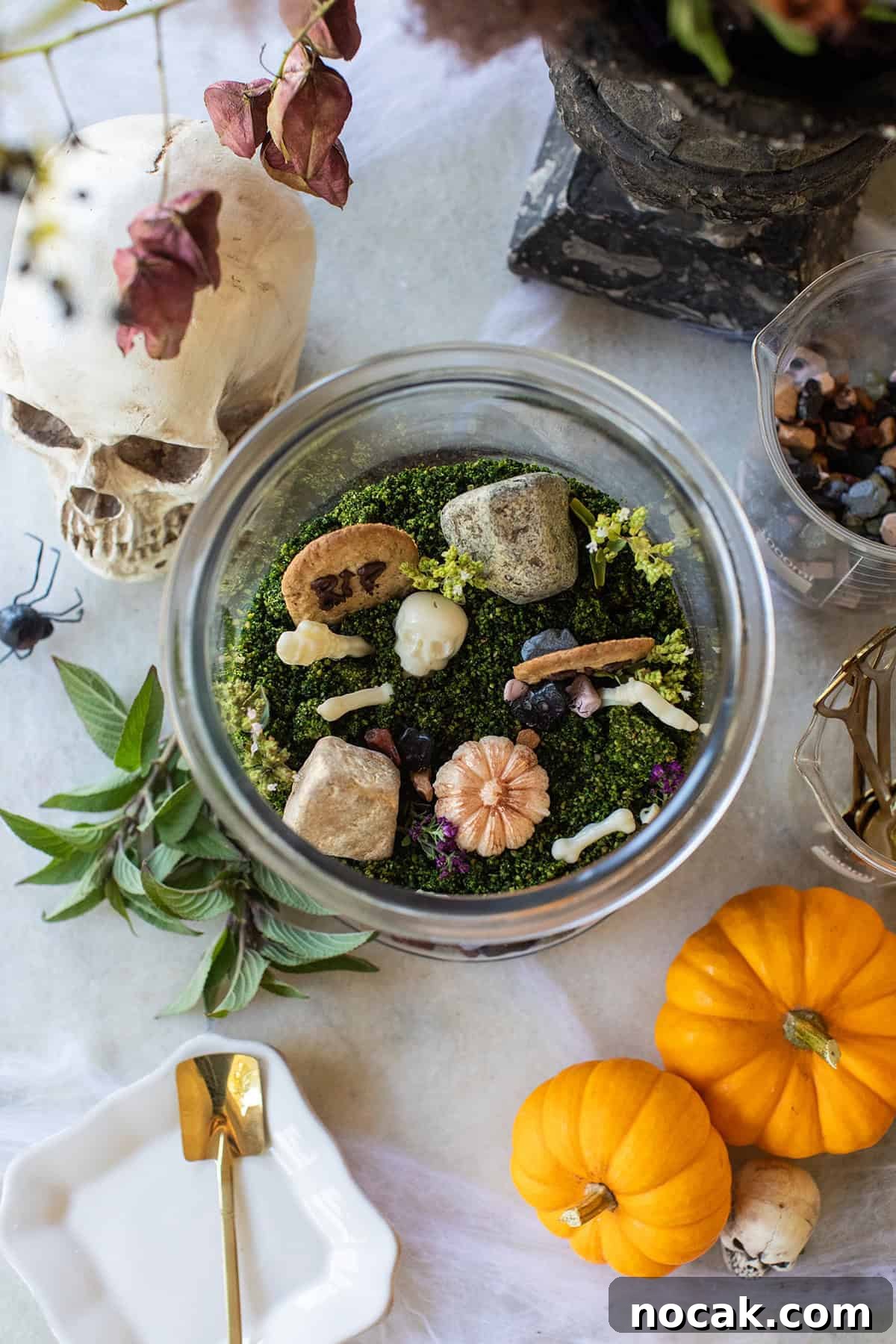 DIY Edible Halloween Terrarium: Spooky Candy Garden Tutorial 3 Halloween dessert that feeds a crowd made with chocolate cake, cookies and frosting.