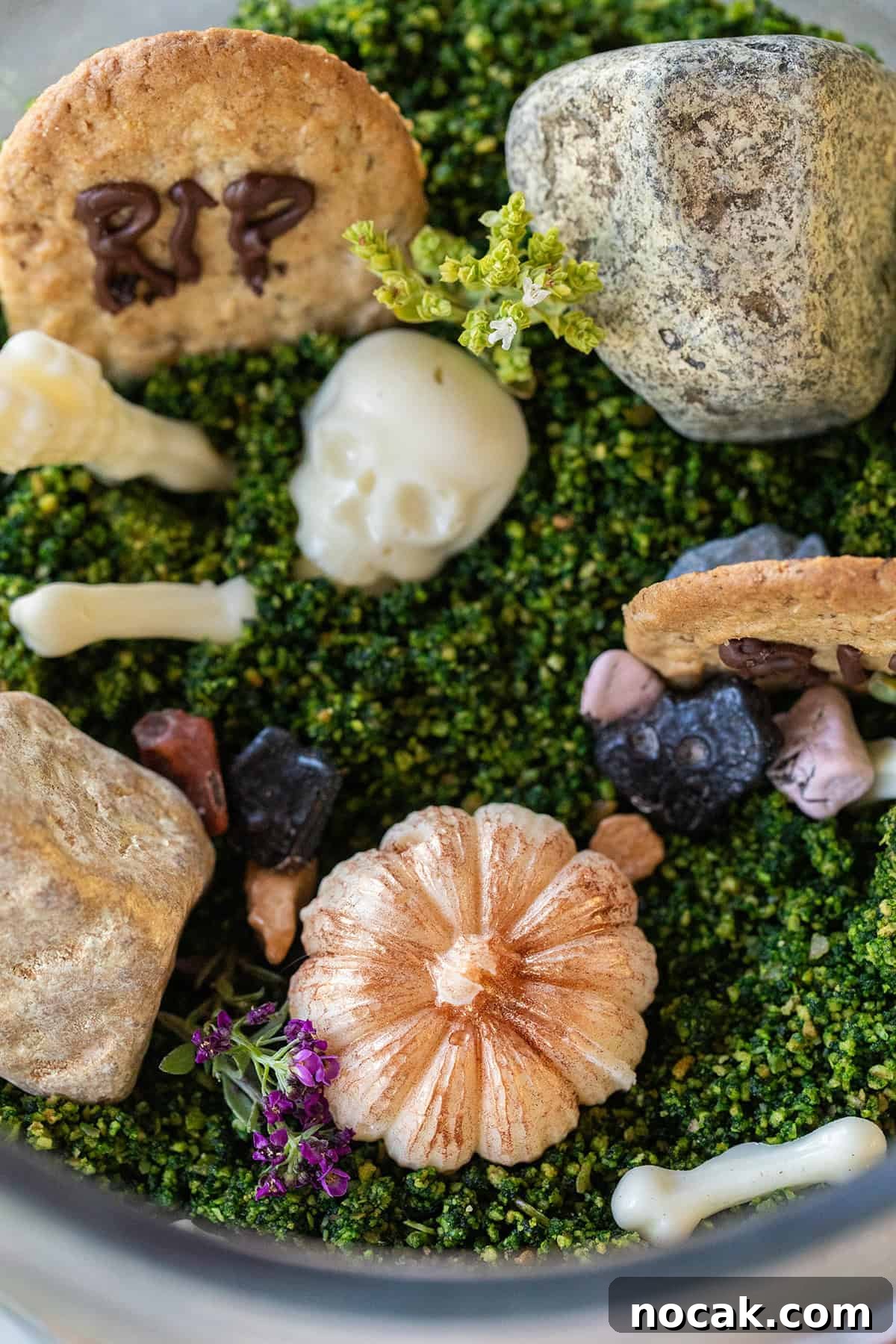 DIY Edible Halloween Terrarium: Spooky Candy Garden Tutorial 4 Edible Halloween chocolate, pumpkins, boulders and bones.