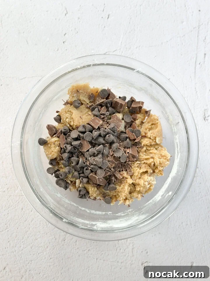 adding in the chocolate chunks and chips.