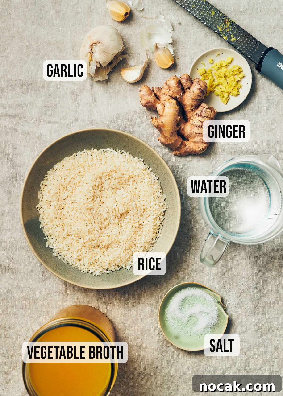 Ingredients to make vegan congee: rice, vegetable stock, water, salt, ginger, garlic.
