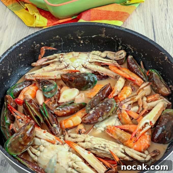 Seafood in Coconut Milk (Ginataang Seafood) Recipe 9 Ginataang Seafood in a wide pan