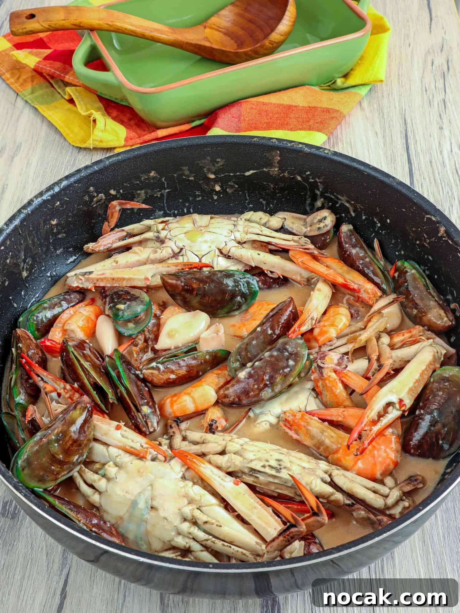 Seafood in Coconut Milk (Ginataang Seafood) Recipe 7 Ginataang Seafood in a wide pan