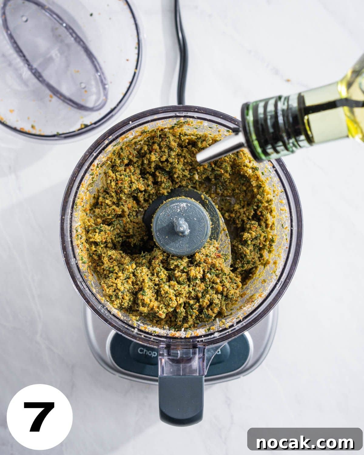 Step 7: drizzling in olive oil.