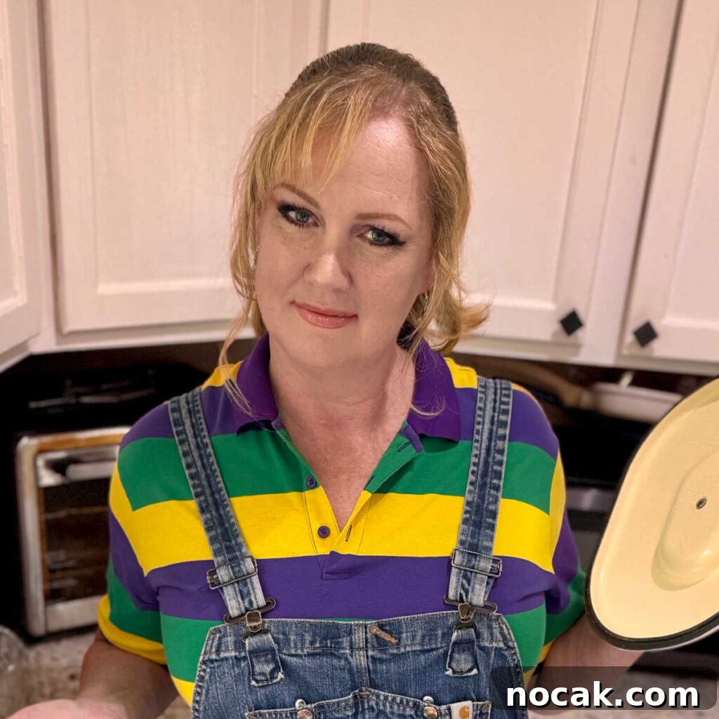 Crawfish-Stuffed Baked Potato Recipe 7 A picture of Melanie Cagle showing something in a cooking pot.