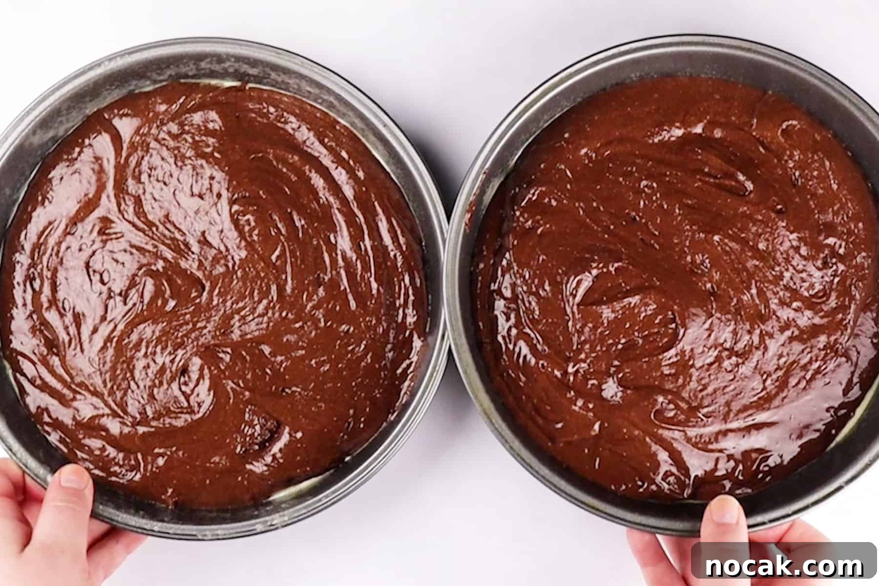 Chocolate Strawberry Layer Cake with Luscious Ganache 6 chocolate cake batter in cake pans.