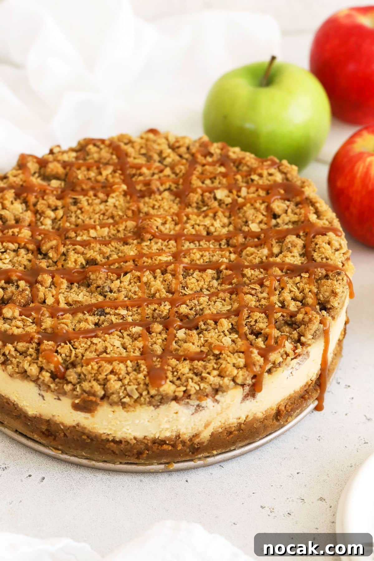 Gluten-Free Caramel Apple Cheesecake Recipe 6 gluten-free apple crumble cheesecake drizzled with caramel sauce