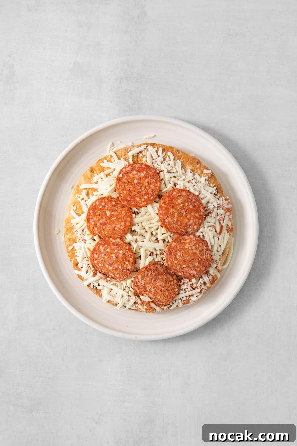 Frozen pizza on a plate Frozen pizza on a plate.