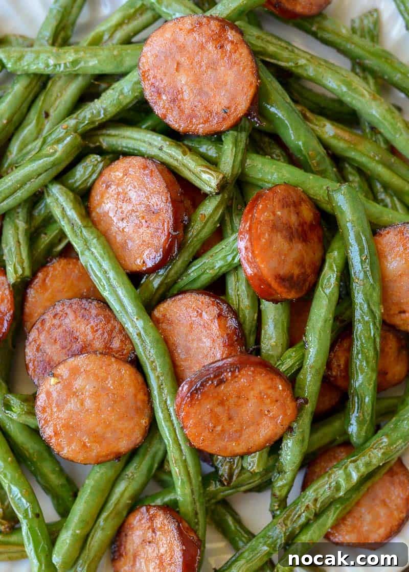 Crispy Air Fryer Green Beans with Smoked Sausage 4 Learn how to make easy Air Fryer Green Beans! Fresh green beans are paired with seasoning and lemon to make the perfect keto side dish!