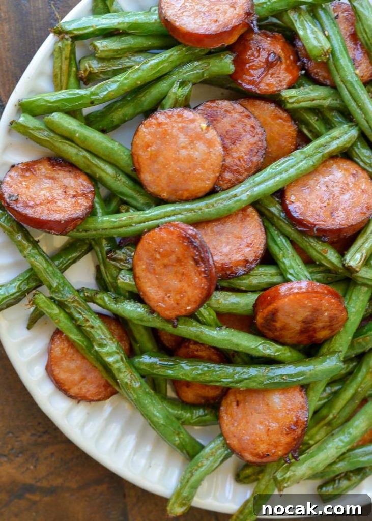 Crispy Air Fryer Green Beans with Smoked Sausage 5 Air Fryer Green Beans and Smoked Sausage is the ultimate 10 minute meal! This low carb dinner has only 6 net carbs per serving and is great for keto meal prep!