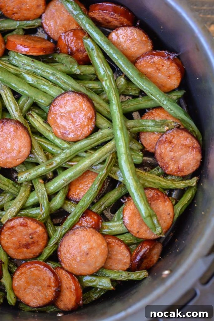 Crispy Air Fryer Green Beans with Smoked Sausage 6 Air Fryer Green Beans and Smoked Sausage is the ultimate 10 minute meal! This low carb dinner has only 6 net carbs per serving and is great for keto meal prep!