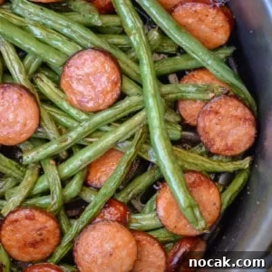 Crispy Air Fryer Green Beans with Smoked Sausage 7 Air Fryer Green Beans and Smoked Sausage is the ultimate 10 minute meal! This low carb dinner has only 6 net carbs per serving and is great for keto meal prep!